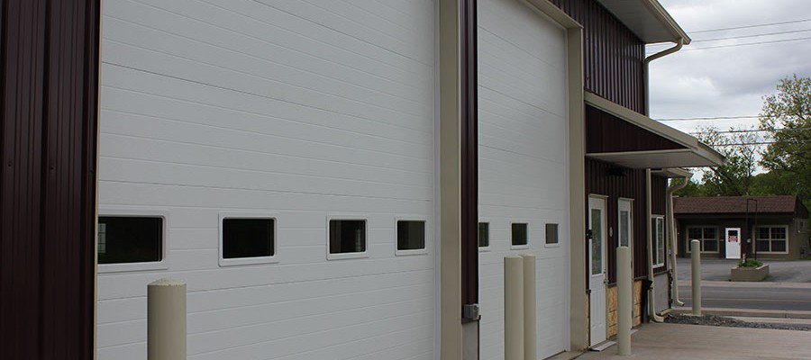 Large drive-in doors on the indoor storage building