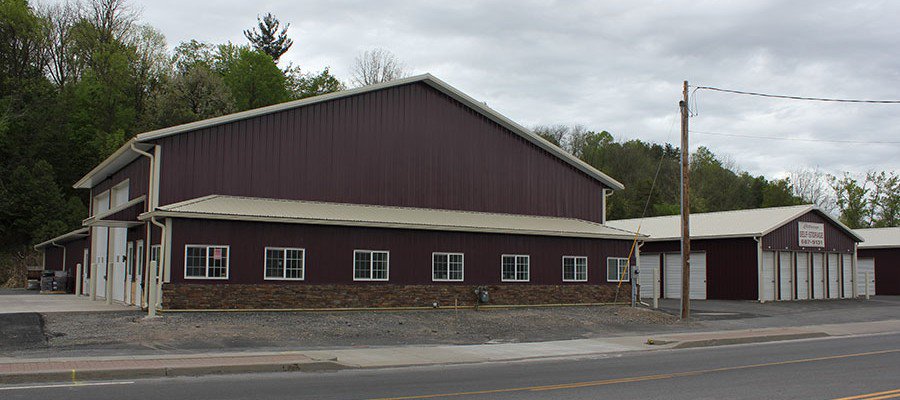 The Chittenango Self Storage facility on Route 5 — maroon buildings with the indoor storage building and drive-up units